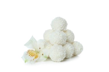 Tasty coconut candies isolated on white background