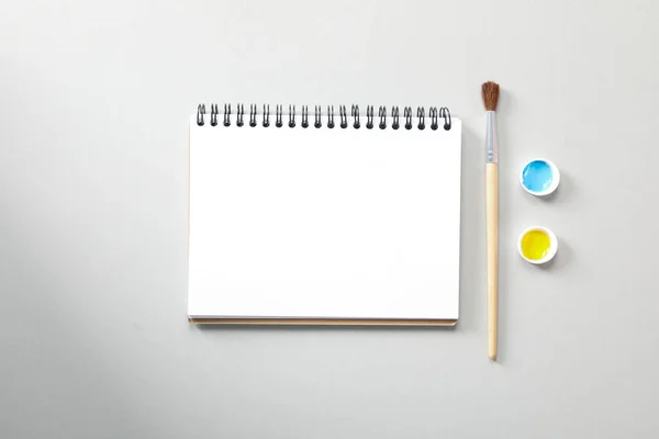 Blank Notebook Brush Paints Top View — Zdjęcie stockowe