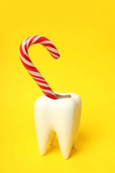 Concept Food Bad Teeth Yellow Background — Zdjęcie stockowe