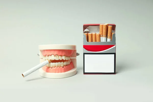 Concept Harm Smoking Teeth Light Background — Fotografia de Stock