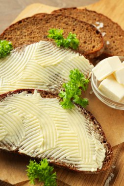 Concept of breakfast, eat food with butter, close up