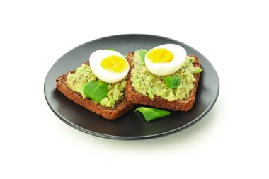 Concept of tasty breakfast, sandwiches with egg, isolated on white background