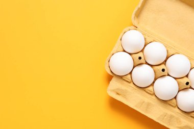 Egg box with eggs, space for text