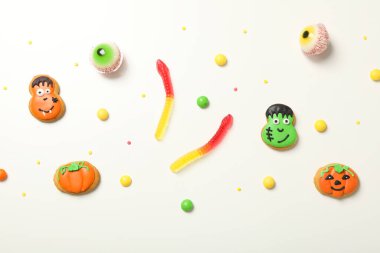 Concept of Halloween sweets, funny sweets, top view