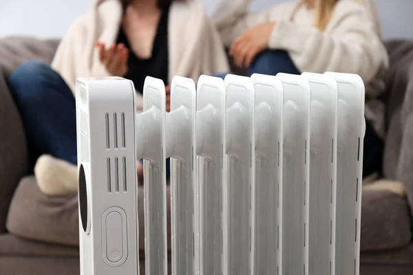 Heating Season Heater Women Sitting Sofa Background Selective Focus — ストック写真