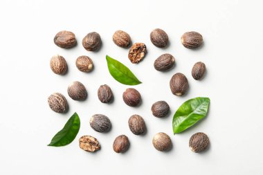 Concept of spices and condiments, nutmegs, top view