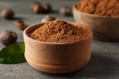 Concept of spices and condiments, nutmeg powder, close up