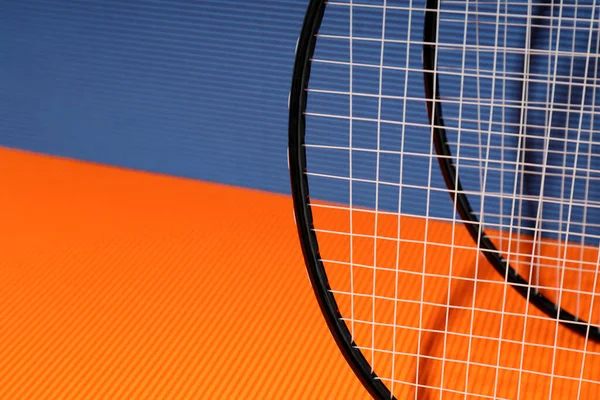 Badminton Rackets Orange Blue Textured Backgrounds — Zdjęcie stockowe