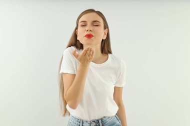 Concept of people, young woman on light background