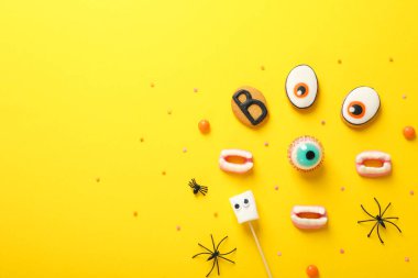 Concept of Halloween sweets, funny sweets, space for text