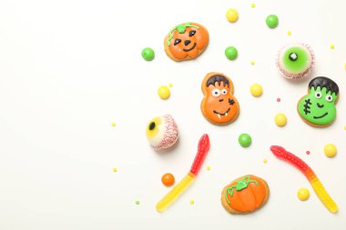 Concept of Halloween sweets, funny sweets, space for text