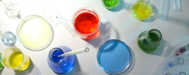 Concept of science and research with laboratory accessories, top view