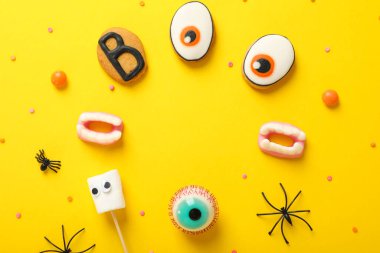 Concept of Halloween sweets, funny sweets, space for text