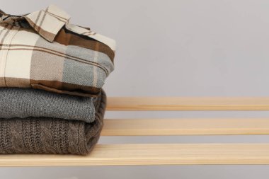 Concept of autumn clothes, autumn season wardrobe