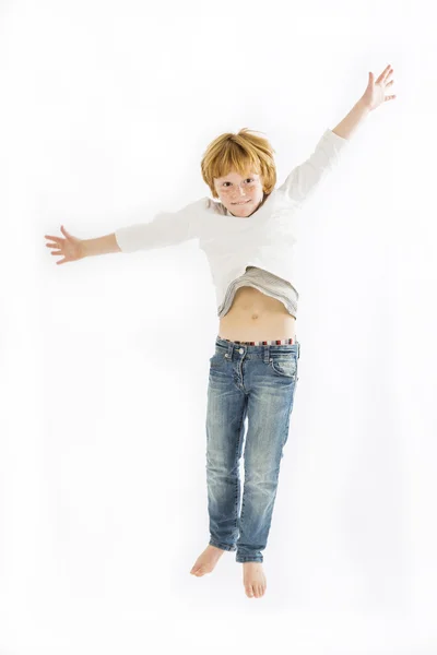 Happy boy jumping — Stock Photo, Image