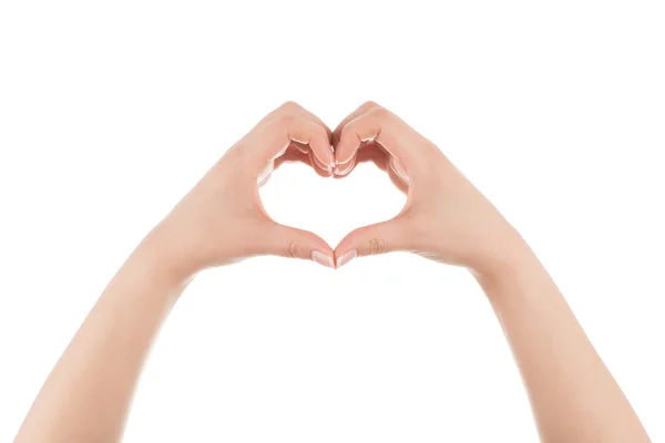 Heart shape made of two woman's hands. — Stock Photo, Image