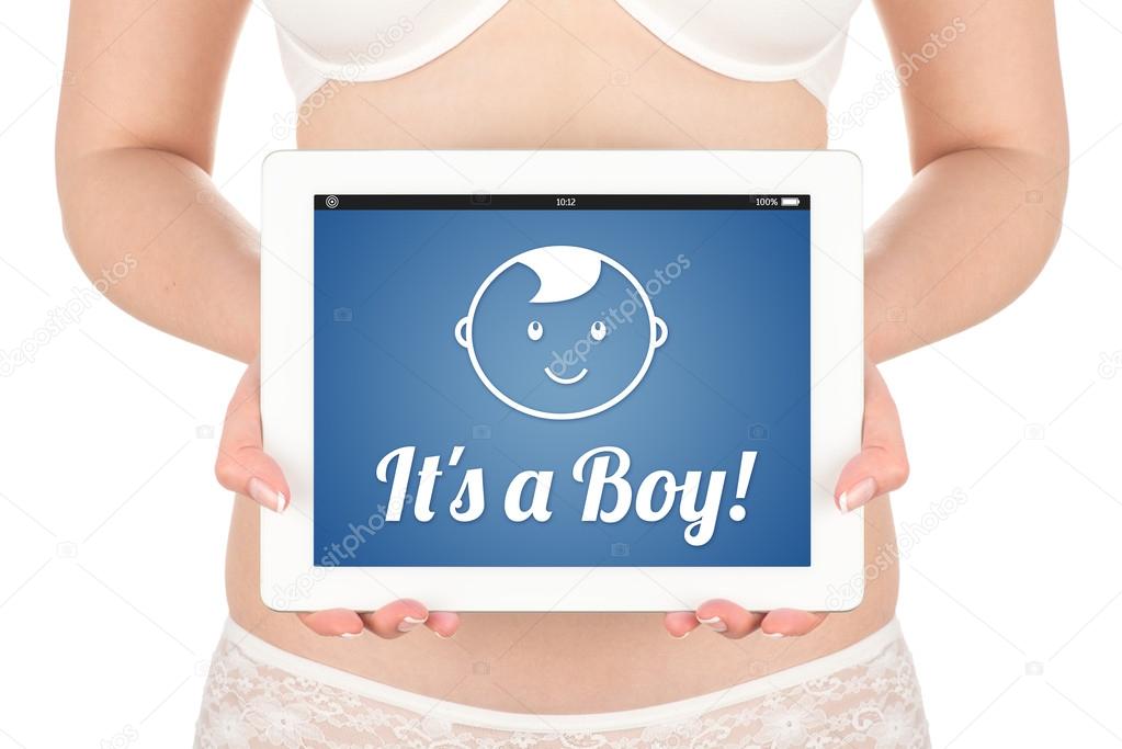 A pregnant woman is holding a tablet computer with the news about the child's gender boy.