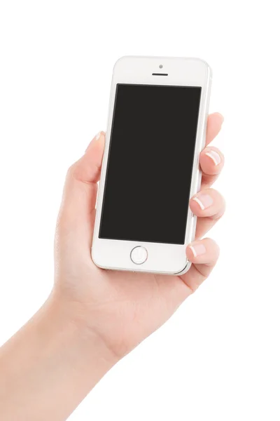 Mano femminile che tiene il moderno smartphone bianco con la s vuota — Foto Stock