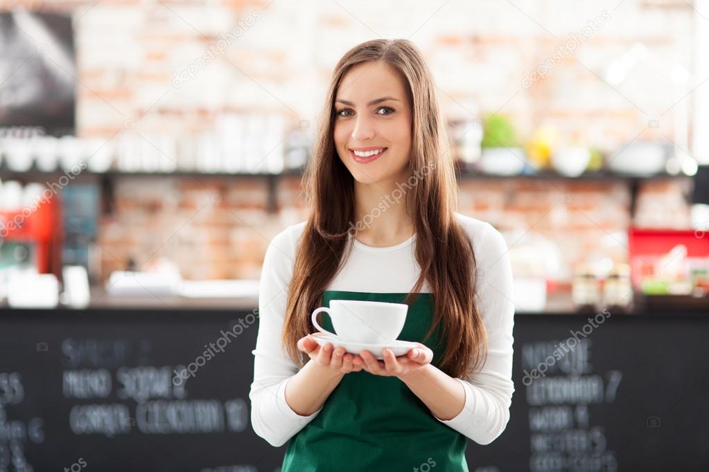 Waitress serving coffee