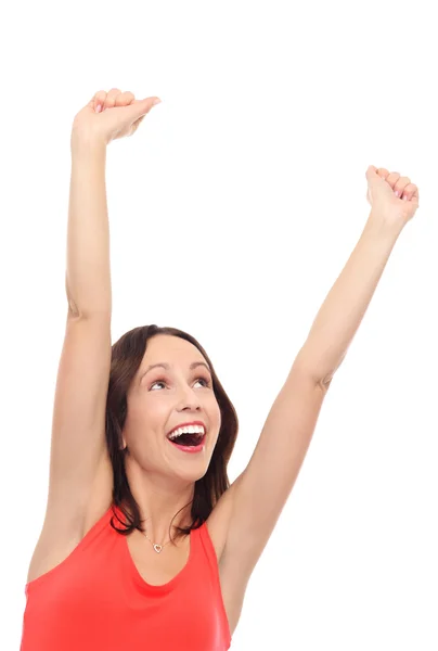 Excited woman with arms raised Stock Photo