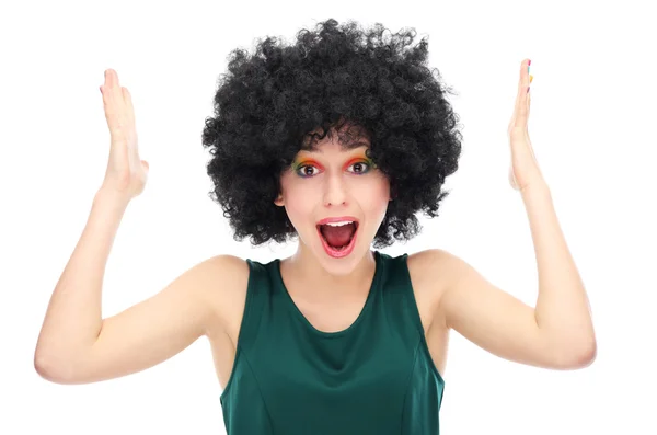 Excited woman wearing afro wig — Stock Photo, Image