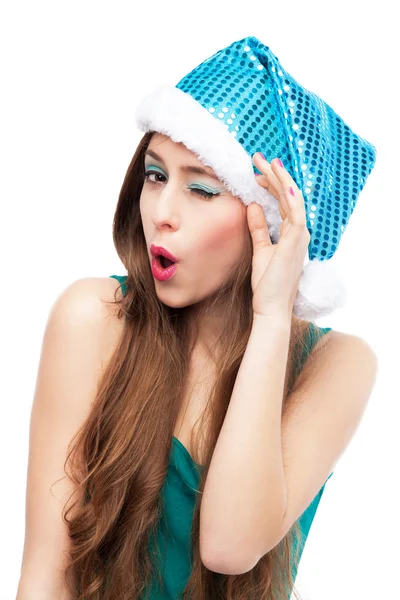 Woman in Christmas hat winking — Stock Photo, Image