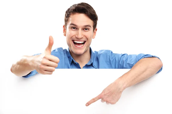 Man with blank poster showing thumbs up Royalty Free Stock Images