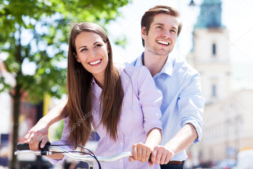 Young couple on bike