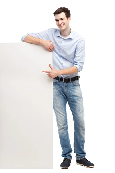 Junger Mann mit leerem Whiteboard — Stockfoto