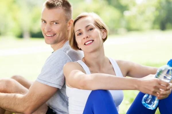 Happy young couple in the park Stock Picture