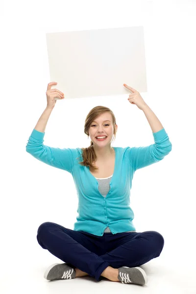 Woman holding blank poster — Stock Photo, Image