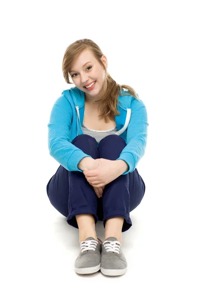 Female teenager sitting — Stock Photo, Image