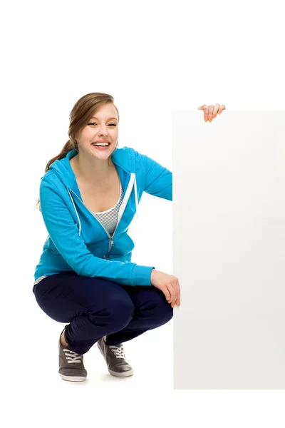 Mujer sosteniendo cartel en blanco — Foto de Stock