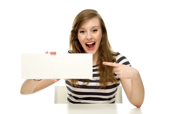 Mujer sosteniendo signo en blanco — Foto de Stock