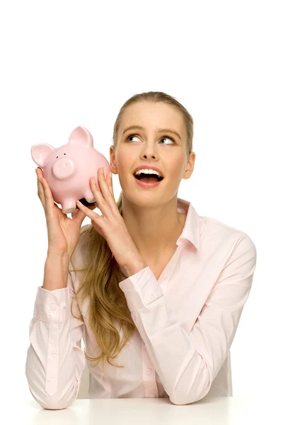 Mulher com piggybank — Fotografia de Stock