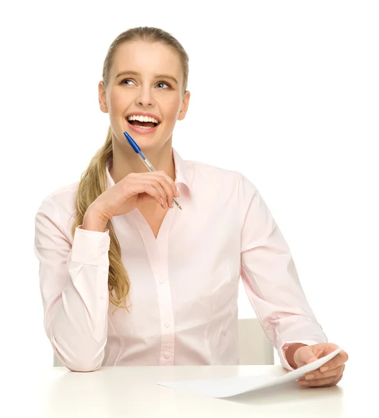 Zakenvrouw zitten aan witte tafel — Stockfoto