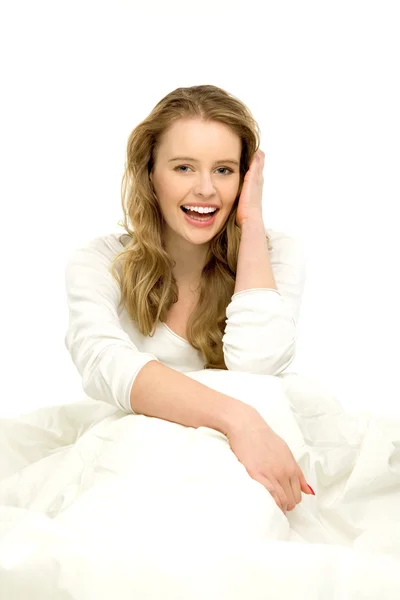 Woman sitting in bed — Stock Photo, Image