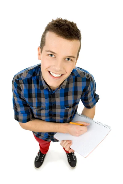 Student med arbetsboken och penna — Stockfoto
