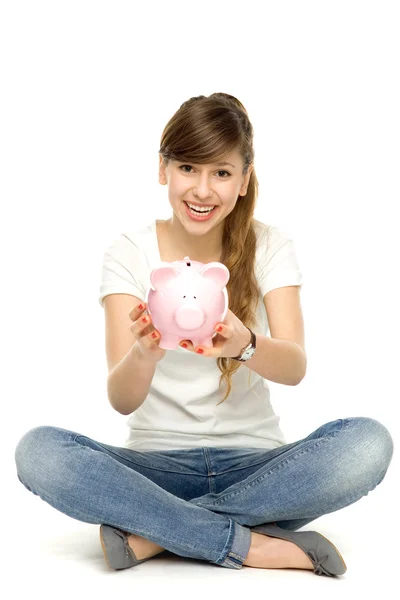 Joven mujer holding piggybank — Foto de Stock