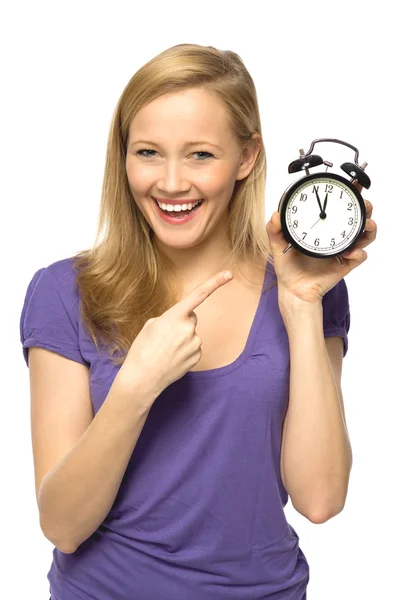 Woman holding clock — Stock Photo, Image