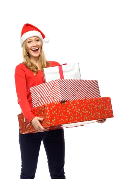 Vrouw in Kerstman hoed, bedrijf geschenken — Stok fotoğraf
