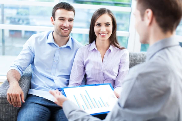 Couple meeting with financial adviser — Stock Photo, Image
