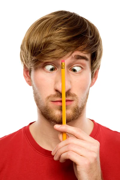Mann hält Bleistift in der Hand — Stockfoto