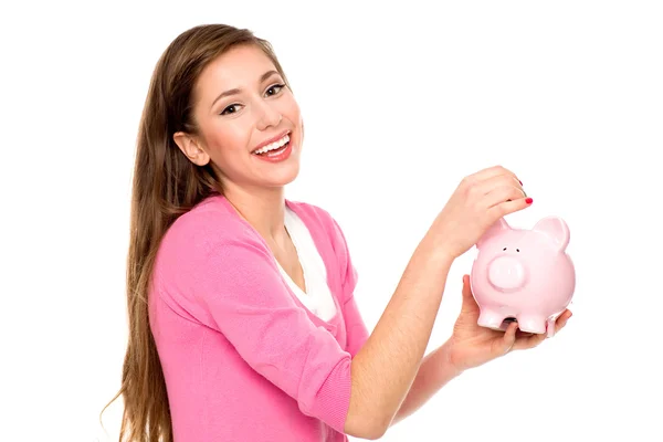 Jovem mulher com porquinho banco — Fotografia de Stock