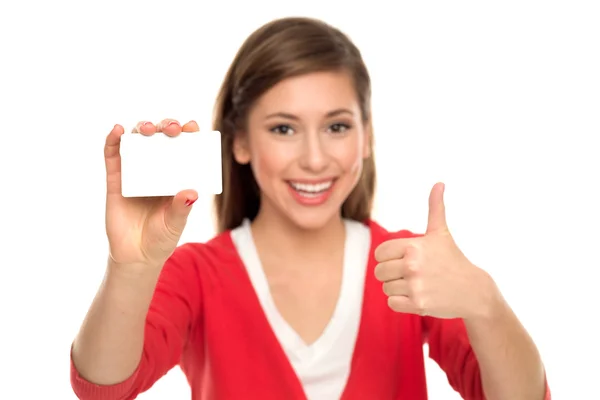 Mujer sosteniendo tarjeta en blanco — Foto de Stock