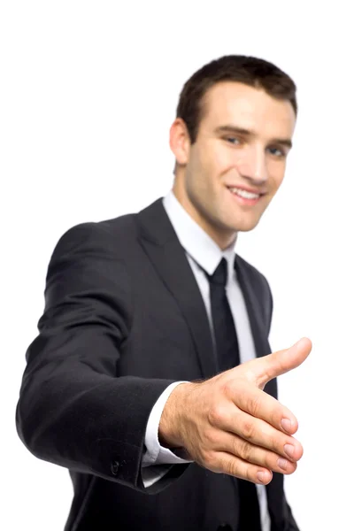 Empresário estendendo a mão para um aperto de mão — Fotografia de Stock