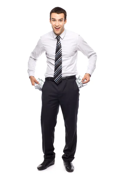 Businessman taking money from his pockets — Stock Photo, Image