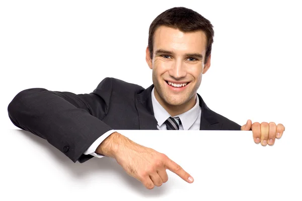 Empresário segurando cartaz em branco — Fotografia de Stock