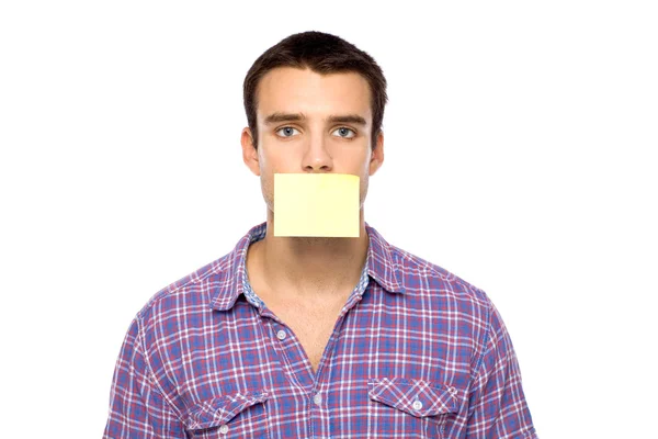 Man with post it on lips — Stock Photo, Image