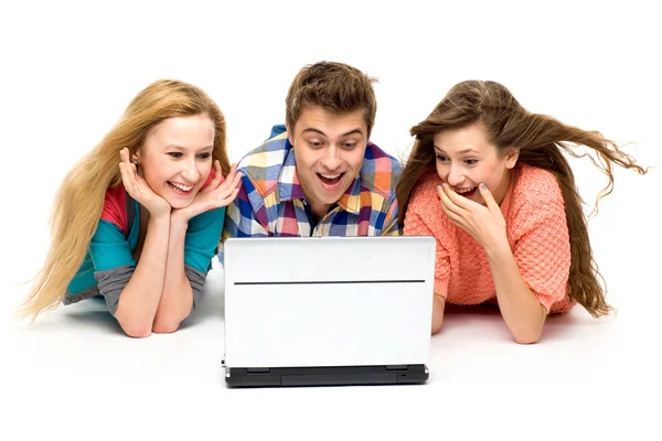 Young looking at laptop Royalty Free Stock Images